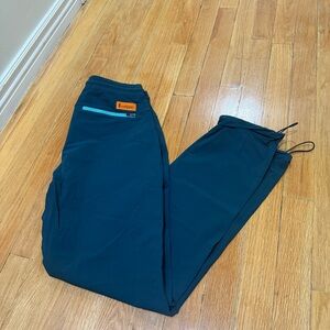Cotopaxi Teal Track Pants with Orange Accent